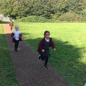 Children running on a Daily Mile Track