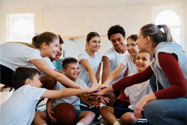 PE Students in a huddle